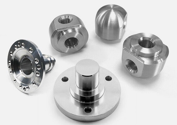 What is the effect of using a magnetic grinder for CNC machining parts to deburr